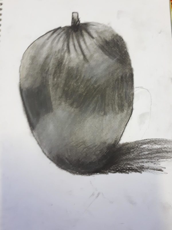 Black and white drawing of an apple