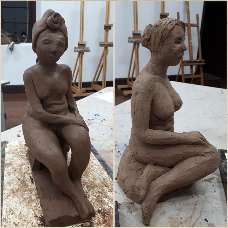 Brown clay sculptures of woman