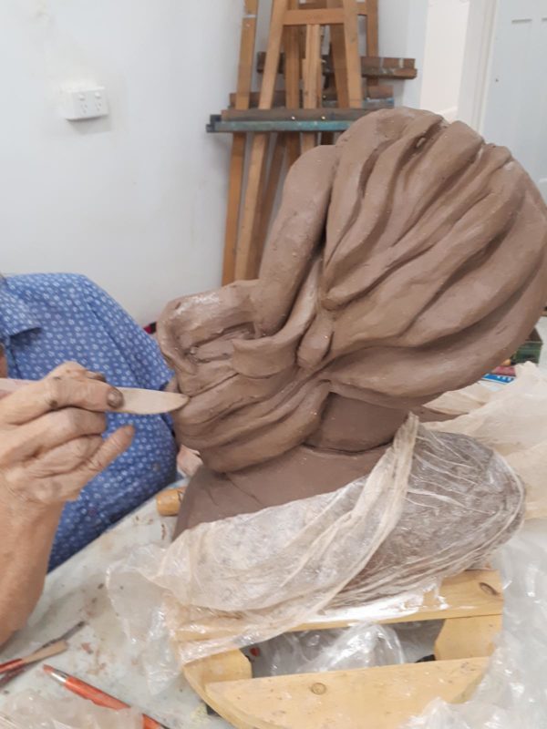 Brown clay sculpture of hair