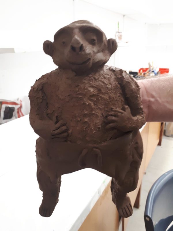 Brown clay sculpture of character