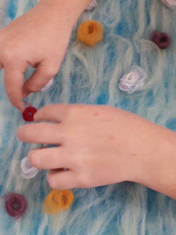 Two hands felting
