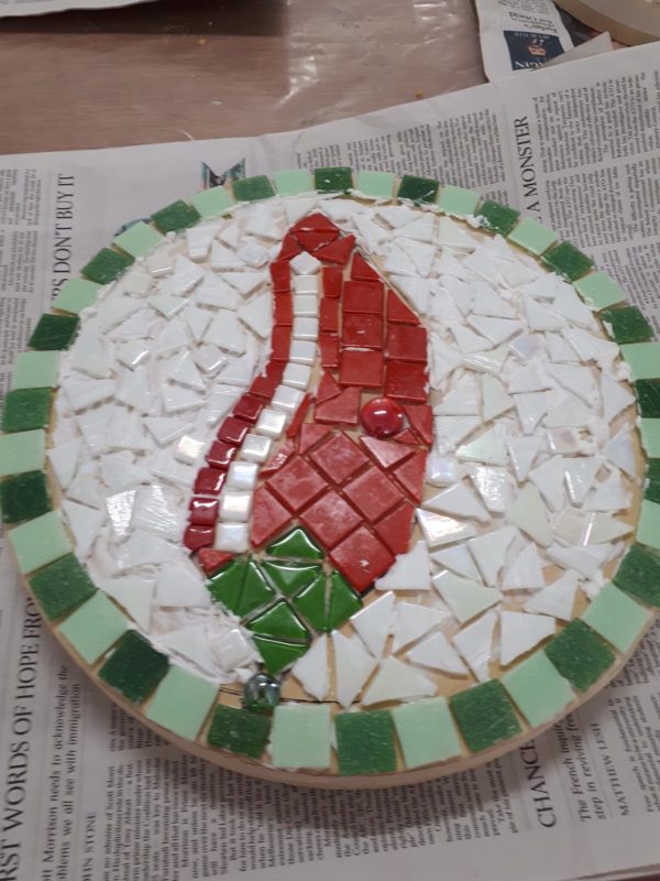 mosaic paver with a red chilli